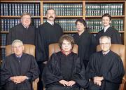 Justices of the Kansas Supreme Court are, back row from left, Robert Gernon, Lawton Nuss, Marla Luckert and Carol Beier, and front row, from left, Donald Allegrucci, Chief Justice Kay McFarland and Robert Davis.