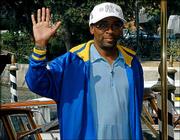 U.S. movie director Spike Lee waves to fans a day before the
opening of the 61st Venice International Film Festival, in Venice,
northern Italy. Lee has an out-of-competition movie, "She Hate Me,"
at the festival and is also part of the nine-person jury. The
11-day show begins today.