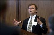 Pat Wood III, chairman of the Federal Energy Regulatory Commission,
delivers a speech at the Kansas Electric Transmission Summit II at
the Dole Institute of Politics. Wood spoke Wednesday at KU.