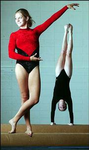 Lawrence High's Chelsey Ornburn, left, and Free State's Sindra
Schueler will lead their schools' gymnastics teams this season.