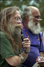 George Moyer and Mike McLees watch as the winners of the
beard-growing contest are announced in South Park. The two both won
in the category of "best mix of styles." Moyer said the judging of
the contest was chaotic but entertaining.