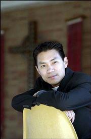 The Rev. Joseph Tung Dang, pastor of St. John the Baptist Catholic
Apostolic Church, is expanding his effort to support Asian
immigrants in Lawrence and Douglas County.