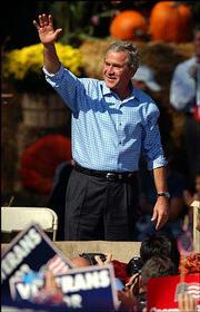 President Bush greets the crowd in Allentown, Pa., the day after
his first debate with Democratic presidential candidate John Kerry.