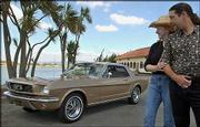 Beverly and Dean Avery look at their 1966 Ford Mustang coupe in San
Leandro, Calif. Baby boomers longing to buy the autos they couldn't
afford in their youth are driving a surge in the classic car
market. The Averys were pictured on Sept. 20.