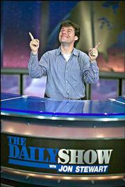 Stewart Bailey, co-executive producer of "The Daily Show," is
pictured on the set of the Comedy Central series. Bailey, a 1989 KU
graduate, is a Topeka native.
