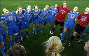 Kansas University soccer players, from left, Nikki Alvarez, Lacey
Novak, Nicole Cauzillo, Monica Brothers, Afton Sauer, Kelsey
Archuleta, goalie Meghan Miller, Emily Strinden and Colleen Quinn
belt out the Rock Chalk chant after defeating Iowa State. The
Jayhawks won, 4-0, Friday at Jayhawk Soccer Complex to earn a share
of the Big 12 Conference regular-season title.