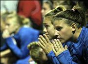 Kansas University soccer players Kim Karfonta, left, and Jessica
Smith watch during double overtime of KU's game against Texas. The
Jayhawks lost, 3-2, in the semifinals of the Big 12 Conference
tournament Friday in San Antonio.