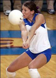 KU's Dani Wittman returns a serve. The Jayhawks swept the Bears,
30-25, 30-23, 30-26, Wednesday night at Horejsi Center.