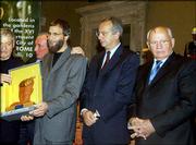 Yusuf Islam, third from right, formerly known as the rock star Cat
Stevens, shows the Gorbachev Foundation Man for Peace 2004 award
after receiving it from former Soviet President Mikhail Gorbachev,
right, and Rome Mayor Walter Veltroni, second from right. Islam
received the award before start at the World Summit of Nobel Peace
Laureates conference Wednesday in Rome. Men at left are with the
Italian chapter of the Gorbachev Foundation.