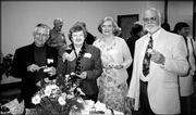 From left are Dick and Rita Tracy, Nora Clark and Allen Wiechert.
They attended the Trinity Episcopal Church Progressive Dinner Oct.
3. The event began with cocktail and hors d'oeuvres at Bishop
Seabury Academy. After dinners at members' homes, the group
gathered at the home of Jerry and Liz Hare for dessert.