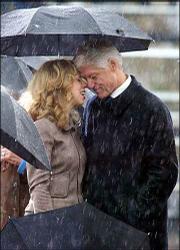 President Clinton and daughter Chelsea Clinton share an emotional
moment at the William J. Clinton Presidential Center during opening
ceremonies Thursday in Little Rock, Ark.