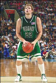 Vermont's Taylor Coppenrath takes aim at the basket before
attempting a free throw late during his junior season. Coppenrath,
a senior, and the Catamounts will travel to take on Kansas
University in the season opener for both squads tonight at Allen
Fieldhouse.