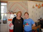 Brenda Sampson and David Carttar work in the kitchen during the
Lawrence Community Nursery School's 33rd annual Fall Festival. The
festival, which was Oct. 30, included an art fair, bake sale,
potluck dinner and silent auction.