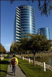 Redwood Shores, Calif.-based Oracle Corp. raised its takeover bid
for bitter rival PeopleSoft Inc. by 10 percent to seal a $10.3
billion deal that will create the world's second-largest maker of
business applications software. The agreement, announced Monday,
caps a Silicon Valley feud that has been marked by surly exchanges
between the companies' management teams and courtroom battles.
