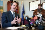 Kansas Atty. Gen. Phill Kline answers questions during a news
conference about the Kansas Supreme Court's decision to overturn
the state's death penalty. Kline says he'll appeal the decision to
the U.S. Supreme Court.