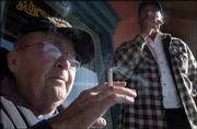 Raymond "Speedy" Perdue hates the smoking ban that the Lawrence
City Commission enacted in July. Perdue uses a wheelchair because
of a stroke and knows it will be a hassle to smoke outside during
the winter months.