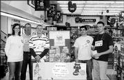 From left are Brianna Kelly, Tom Patchen, Jason Moulin, Torey
Gerwin and Bob Podany. They helped raise funds for the Boys and
Girls Club of Lawrence at Dillons, 1740 Mass. Roundup Day, when
club representatives ask Dillons customers if they would like to
round up the total of their purchases to benefit the nonprofit
organization, was Oct. 30. Patchen is president of the club's board
of directors.