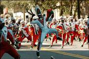 Assistant Drum Major Byron Jackson leads the Marching 100 Rattlers
Band of Florida A&M during the 20th annual MLK Drum Major for
Justice National Parade in St. Petersburg, Fla. The parade was one
of many held across the nation in honor of Martin Luther King Jr.
Day.