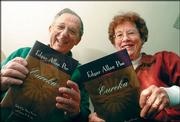 Stuart and Susan Levine show off copies of their new annotated
version of Edgar Allan Poe's "Eureka," which lays out Poe's
thoughts on science and how the universe began.