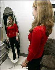 Karen Wakefield, an event planner from Woodinville, Wash., has had
a nose job, dermabrasion, liposuction, tummy tuck, breast lift and
Botox treatments. Wakefield, who visited cosmetic surgeon Dr. David
Stephens on Thursday in Bellevue, Wash., is opposed to a proposed
Washington state tax on cosmetic surgery.