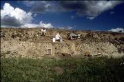 Archaeologists excavate a site in Sherman County, near the Colorado
border, which scientists now believe contains the earliest evidence
of human existence in the Great Plains. The archaeologists --
including representatives from Kansas University -- have worked on
the site the past two summers.