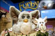 Hasbro Inc.'s Furby boasts a new technology called emotronics that
brings the toy more to life. Furby, which can speak interactively
with children, is on display at the American International Toy Fair
in New York.