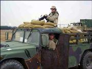 First Lt. Drew Polen, Pittsburg, and gunner Sgt. Jared Worley,
Olathe, prepare their vehicle for a convoy in Iraq.<br>
<a href=
"http://etc.lawrence.com/galleries/Bootsonthegr/7748_lores.html"
target="_new" onclick=
"window.open(&squot;http://etc.lawrence.com/galleries/Bootsonthegr/7748_lores.html&squot;,&squot;Photo&squot;,&squot;height=650,width=550,screenX=10,screenY=10,&squot; + &squot;scrollbars,resizable&squot;); return false;">
<img src="http://www.ljworld.com/art/icons/icon_photo.gif" border=
"0" alt="photo"> Photo Gallery: Boots on the ground</a><br>