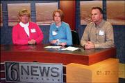 2005 Lawrence Leadership class members, from left, Jane Blocher,
Lynn Parman and Scott McMichael practice their broadcasting skills
at 6News. They participated in Civic Roles and Media Day on Jan. 27
at The World Company.
