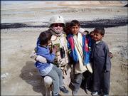 First Lt. Dennis Sewell, of Clay Center, has his picture taken with
some Iraqi children who he encounters on a regular basis. He and
his fellow soldiers hand out gifts regularly. Sewell is with the
891st Engineer Battalion in Iraq.<br>
<br>
The Journal-World is seeking any photos taken of Kansas troops
serving in action overseas. To submit a photo, e-mail Bill Snead at
<a href="mailto:bsnead@ljworld.com">bsnead@ljworld.com</a>, or send
the photo by mail to "Soldier Photos," c/o Lawrence Journal-World,
645 N.H., Lawrence 66044.<br>
<br>
<a href=
"http://etc.lawrence.com/galleries/Bootsonthegr/7834_lores.html"
target="_new" onclick=
"window.open(&squot;http://etc.lawrence.com/galleries/Bootsonthegr/7834_lores.html&squot;,&squot;Photo&squot;,&squot;height=650,width=550,screenX=10,screenY=10,&squot; + &squot;scrollbars,resizable&squot;); return false;">
<img src="http://www.ljworld.com/art/icons/icon_photo.gif" border=
"0" alt="photo"> Photo Gallery: Boots on the ground</a><br>