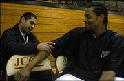 Kansas City Knights center Jeff Graves, right, is examined by
orthopedic surgeon Prem Parmar before a game against the Colorado
Storm. Graves, a former Kansas University player shown Thursday at
Johnson County Community College in Overland Park, is playing for
the ABA squad in hopes of eventually making an NBA roster.