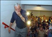 Roy Williams' decision to leave KU for North Carolina in 2003 and
his brief fieldhouse news conference came in at No. 32 on the
KUSports.com viewers' top-50 list.