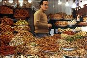 A Moroccan man displays heaping trays of fresh pastries in a souk
(marketplace) in one of the cities recently visited by Dave and
Gunda Hiebert, of Lawrence.