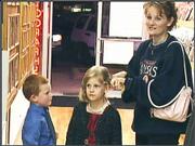 Keira Welter, right, and two of her children, from left, Addison,
5, and Salyn, 7, received tickets to the KU-K-State basketball
game. The Welters received the tickets Wednesday from Ace Sports
& Tickets, 647 Mass.
