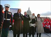The Oak Ridge Boys perform the national anthem on the front lawn of
the Capitol as they help launch a campaign to teach Americans the
lyrics to "The Star-Spangled Banner." They were joined Thursday by
U.S. Marines who just returned from Iraq, and Washington, D.C.,
elementary students.
