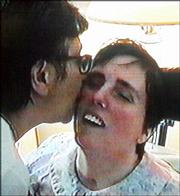 Terri Schiavo gets a kiss from her mother, Mary Schindler, in this
Aug. 11, 2001, image taken from videotape and released by the
Schindler family. Schiavo's feeding tube was removed Friday,
against the will of her parents.