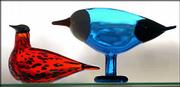 Iittala glass birds perch on a window-front shelf at KOJO, a
gallery and design boutique at Eighth and New Hampshire streets.
Designer Carl Masters opened the shop in December.