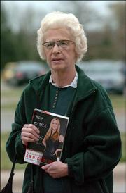 Kay Wright, Lawrence, carries a copy of Ann Coulter&squot;s book "How to
Talk to a Liberal." Wright hoped to get it signed for her son, Lt.
Col. Kevin Wright, of Fort Knox, Ky.