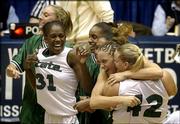 Michigan State players celebrate their 76-69 victory over Stanford
in the championship game of the Kansas City Regional. With the
victory Tuesday in Kansas City, Mo., the Spartans advanced to play
Tennessee in the Final Four.