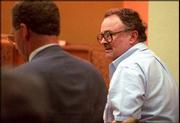 Leroy Hendricks, right, sits by his attorney during his trial on
Oct. 4, 1994, in a courtroom in Wichita. Hendricks has had what the
U.S. Supreme Court calls a "chilling history" of sexually abusing
children starting in 1955. He was the first person committed under
a law that allowed high-risk sex offenders to be kept against their
will after they finished serving their criminal sentences.
Hendricks is now scheduled to move to Lawrence.
