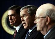 After receiving a presidential committee&squot;s report on U.S. spy
efforts, President Bush promised "concrete action" on the panel&squot;s
74 recommendations, many of which can be implemented without
congressional approval. "To win the war on terror, we will correct
what needs to be fixed," he said. He was joined Thursday in
Washington, D.C., by Sen. Chuck Robb, D-Va., left, and Judge
Laurence Silberman, who are co-chairman of the commission.
