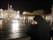As Pope John Paul II was treated for a high fever late Thursday, a
nun prays in St. Peter's Square at the Vatican. The pope suffered
heart failure while being treated for a urinary tract infection,
and was being treated at the Vatican with antibiotics, the pope's
spokesman said. The development came one day after the 84-year-old
pontiff began receiving nutrition through a feeding tube.