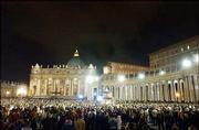 Thousands of people pray in a floodlit St. Peter's Square at the
Vatican. The crowd of pilgrims gathered Friday as Pope John Paul
II's health deteriorated. Some had tears in their eyes as they
gazed up at the pontiff's third-floor window and others held
candles in a vigil repeated in churches around the world.