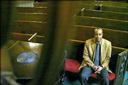 The Rev. Coleman Gilchrist sits in a pew inside the Second
Presbyterian Church in Chicago. In the midst of an urban revival,
the historic church is reaching out for new members.