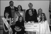 Job's Daughters of Baldwin presented $2,980 to Hearing Impaired
Kids Endowment recipient Ivie Sparks, second from left in front
row. The service and leadership organization for girls donated the
money Feb. 19. Pictured are, back row from left, Darin Mason,
associate grand guardian, Deann Mason, Leslie Goodyear, grand
guardian, and Alyssa Slapper; front row from left, Sabra Lamb, Ivie
Sparks and her mom, Sharon Sparks, and Jessie Waller. Ivie will use
the money to purchase hearing assistance devices. The group is
having a spaghetti dinner fund-raiser from 6 p.m. to 8 p.m. April
23 at the Palmyra Lodge in Baldwin.