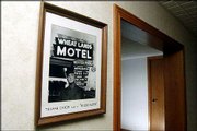 Truman Capote&squot;s portrait hangs in the lobby of the Wheat Lands
motel in Garden City, Kan. The motel was his home base in Garden
City, Kan., while he conducted interviews for "In Cold Blood."<br>
<a onclick=
"window.open(&squot;http://www2.ljworld.com/photos/galleries/2005/apr/03/in_cold_blood_a_legacy_in_photos/166/&squot;, &squot;PhotoGallery&squot;, &squot;width=650,height=650,scrollbars=yes,resizable=yes&squot;); return false;"
href=
"http://www2.ljworld.com/photos/galleries/2005/apr/03/in_cold_blood_a_legacy_in_photos/166/">
<img src="http://www.ljworld.com/art/icons/icon_photo.gif" border=
"0" alt="text"> See slide show »</a>