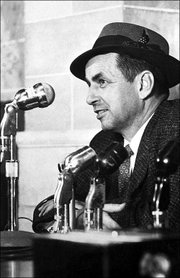 Kansas Bureau of Investigation agent Alvin Dewey Jr. didn't smile
often during the stressful investigation of the Clutter family
murders. He did, though, just after New Year's Day, 1960, when he
told journalists about the capture of the two killers, Perry Smith
and Richard Hickock.