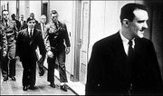 Killers Richard Hickock, foreground, and Perry Smith, in suit, walk
through the federal courthouse in Topeka in this 1963 photo taken
by Bill Snead of the Journal-World, who was then a photographer for
the Topeka Capital-Journal.