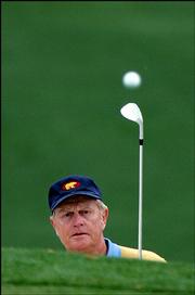 Jack Nicklaus watches his shot to the seventh green during the
first round of the 2005 Masters. Nicklaus, in what might be his
final Masters, was 4 over par after 12 holes when play was
suspended because of darkness Thursday at the Augusta National Golf
Club in Augusta, Ga.