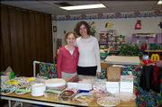 Logan Masenthin, 11, and her mentor Beth Dwyer, of Eudora, are
pictured at Logan's bake sale. She organized and sponsored a bake
sale Feb. 27 at Immanuel Lutheran Church to raise money for the
Lawrence Open Shelter/Drop-In Center. Her sale raised $167. Logan
and Dwyer used the proceeds and donations they collected from
church members to buy toiletries and food items for the shelter.
The project was a service learning project for Immanuel Lutheran
Church's early communion and Christian mentoring program. Logan's
parents are Lee and Tricia Masenthin, Lawrence, and Doug and
Melissa Jackson, Kansas City, Mo.