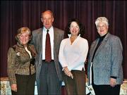 David Ambler, president of the 2004 United Way of Douglas County
board, recognizes board members who ended their terms in March.
From left are Judy Billings, Ambler, Betty Morris and Dee Bisel.
Not pictured are Al Ballard, Mike Maddox and Jessica St. Clair. The
group gathered for the United Way of Douglas County's annual
meeting Feb. 24 at the Lawrence Arts Center, 940 N.H.